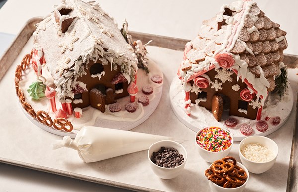 Two gingerbread houses with colourful decoration