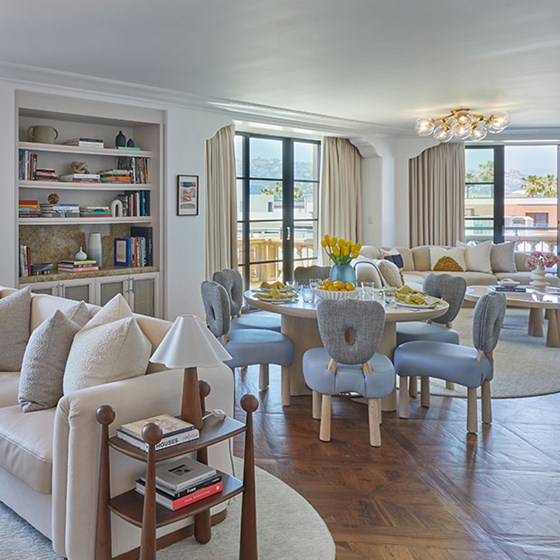 California Suite at The Maybourne Beverly Hills - living room and dining room view with windows at the back