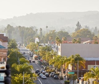 Hollywood Suite at The Maybourne Beverly Hills - view over a road in Beverly Hills with hills on the background