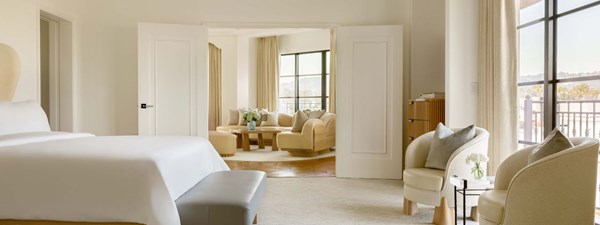 the maybourne bevely hills hollywood suite  bedroom with  french doors