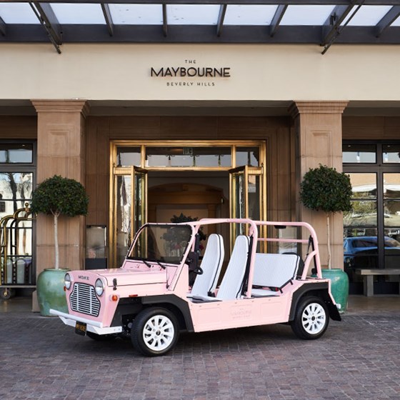 Pink moke parked outside The Maybourne Beverly Hills hotel